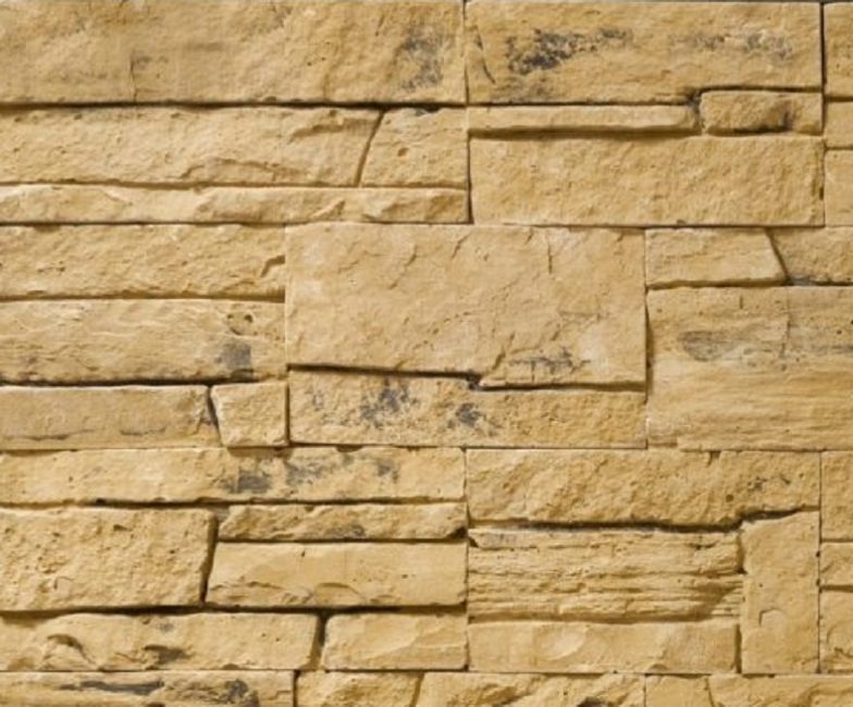 En utilisant des carreaux à base de gypse, vous pouvez imiter différents types de pierre