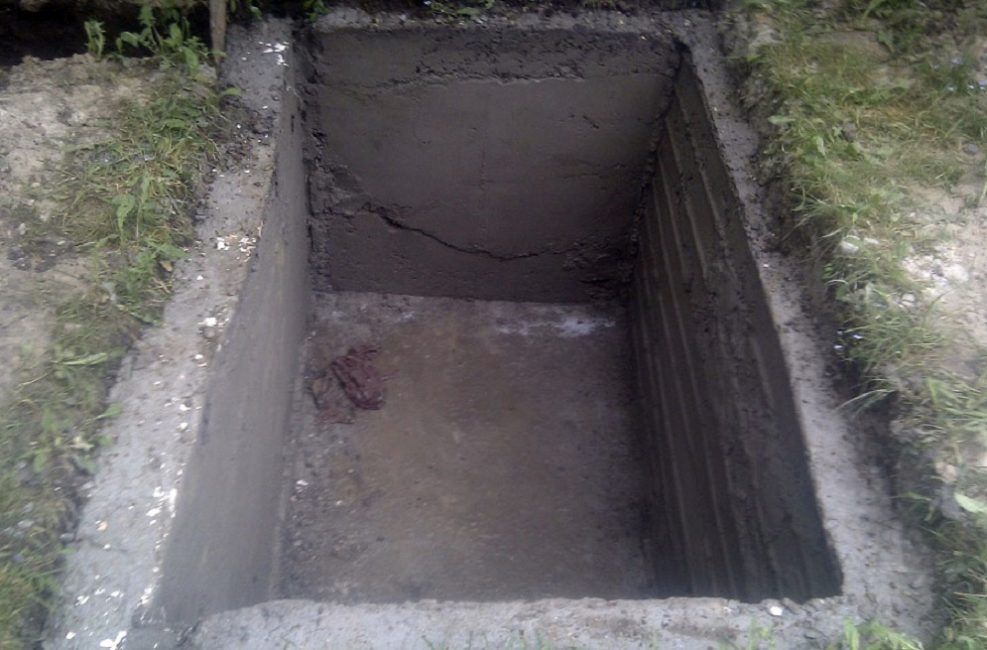 Murs en béton plâtrés du puisard