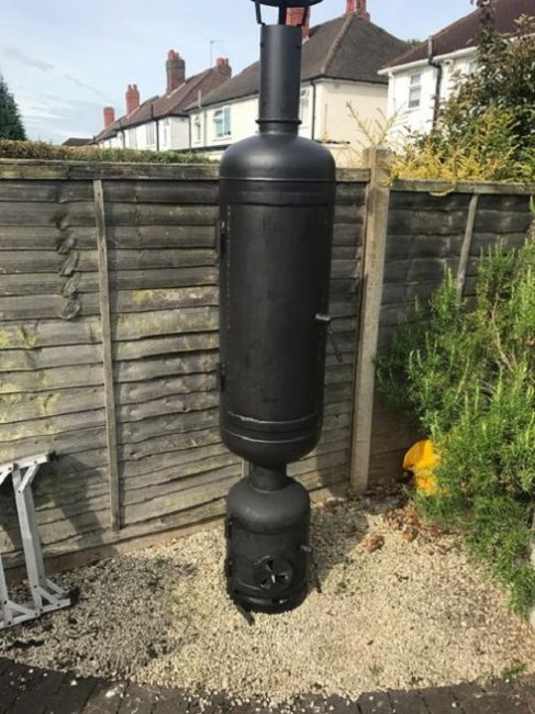 Chambre de fumage d'une bouteille de gaz avec un tuyau