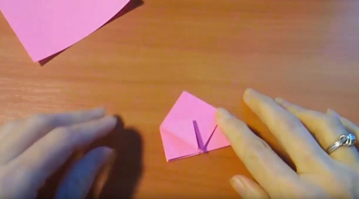 Pliez deux coins vers le milieu